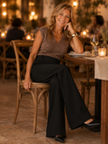 Duna modern loose trousers worn at a dinner table